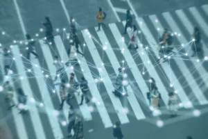 An aerial view of people in a cross walk